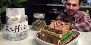 A cake, jar of bud, and raffle tickets welcome patients at the Apothecary dispensary by way of getting into the holiday spirit.