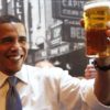 President Obama holding a pint of his favorite beer, Yuengling Lager.