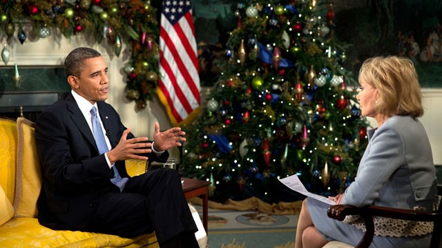 President Obama speaking with Barbara Walters in front of Christmas tree, discussing why he feels enforcing a federal crackdown on legalized states is not a priority.
