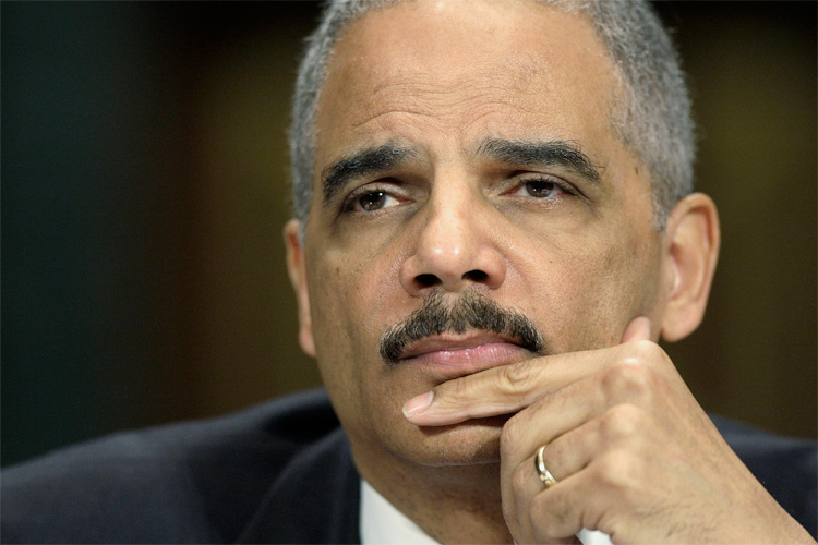 U.S. Attorney General Eric Holder listens to a question at a hearing of the Senate Judiciary Committee on Capitol Hill in Washington, March 6, 2013. REUTERS/Jonathan Ernst (UNITED STATES - Tags: POLITICS CRIME LAW) - RTR3ENGY