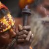 A Hindu Holy man smokes marijuana during the "Shivaratri" festival at the courtyard of the Pashupatinath temple in Katmandu, Nepal, Sunday, March 10, 2013. "Shivaratri", or the night of Shiva, is dedicated to the worship of Lord Shiva, the Hindu god of death and destruction.(AP Photo/Niranjan Shrestha)