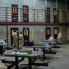 Tables with stools attached offer a break in rows of prison cells, where John "Pops" Walker will be spending the next 21 years of his life for conspiracy to distribute marijuana and tax evasion.