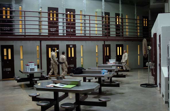 Tables with stools attached offer a break in rows of prison cells, where John "Pops" Walker will be spending the next 21 years of his life for conspiracy to distribute marijuana and tax evasion.