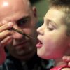 Jason David administers oral drops of a medical marijuana tincture that he says has greatly helped control the symptoms of his son Jayden's severe epilepsy in Modesto, California, July 20, 2012.