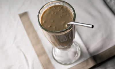 A shake glass filled with a medicated date smoothie.