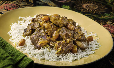 An edible dish of curried cannabis lamb on a bed of rice.