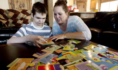 Jennifer May builds a puzzle with her son, Stockton, in Pleasant Grove, Utah. Stockton suffers from debilitating seizures that keeps him from going to a full day of school and has severely stunted his development to that of a toddler. May is leading a push to draft a measure to be introduced in the Utah legislature that would allow her to bring back a liquid form of medical marijuana from Colorado that is working for children with the same syndrome.