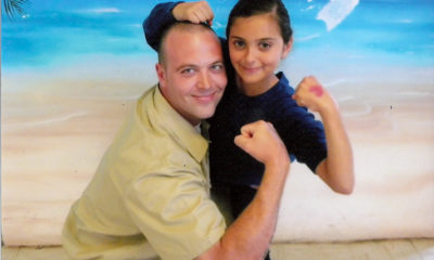 Luke Scarmazzo and his daughter, taken during a visit at FCI Lompoc.