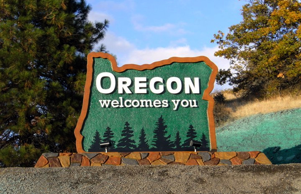 A welcome to Oregon sign greets many people seeking marijuana in this newly legalized state.