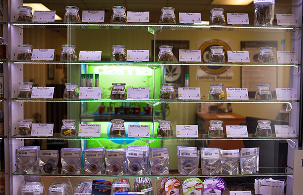 Shelves full of product at a dispensary in Washington where Cannabis Collectives are still labeled illegal