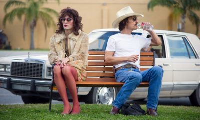 Still of Jared Leto and Paul McCartney sitting on a bench in the movie Dallas Buyer's Club.