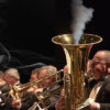 The tuba player of the Colorado Symphony has smoke coming out of the bell of his instrument at CS's famous "bring your own marijuana" concerts.