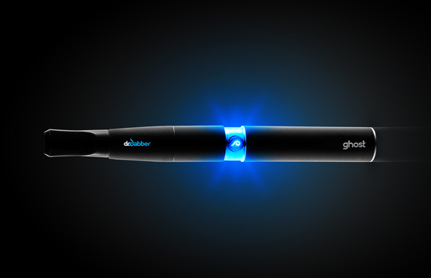 A Dr. Dabber vapor pen glows blue against a dark background.