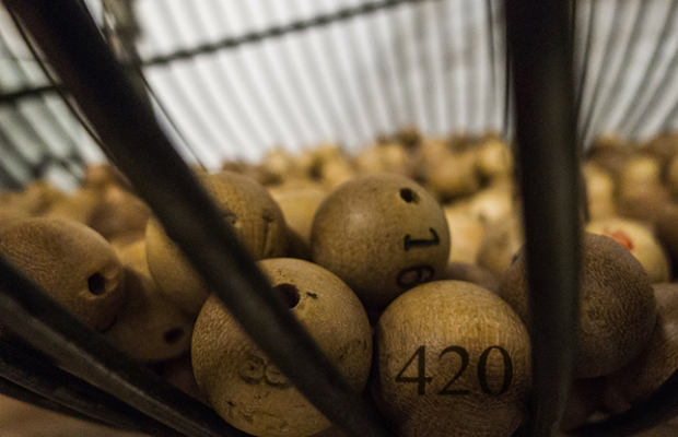 A cage full of lottery balls represent the cannabis license lottery in Washington.