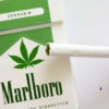 A parodied Marlboro pack shows a green banner and pot leaf.