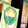 A National Cannabis Industry and Association banner covers the front of a podium at the Denver expo in July, 2014.