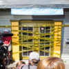 Caution tape covers the door of a dispensary in Seattle, WA due to a cannabis shortage after recreational legalization.