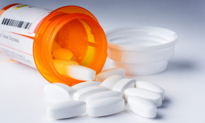 A prescription bottle full of Hydrocodone is spilled over as more of these drugs will be distributed now that it has been labled a Schedule II drug by the DEA.