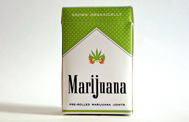 A pack of joints packaged too look like Marlboro cigarette packs. Pack is green with the word Marijuana stamped on front