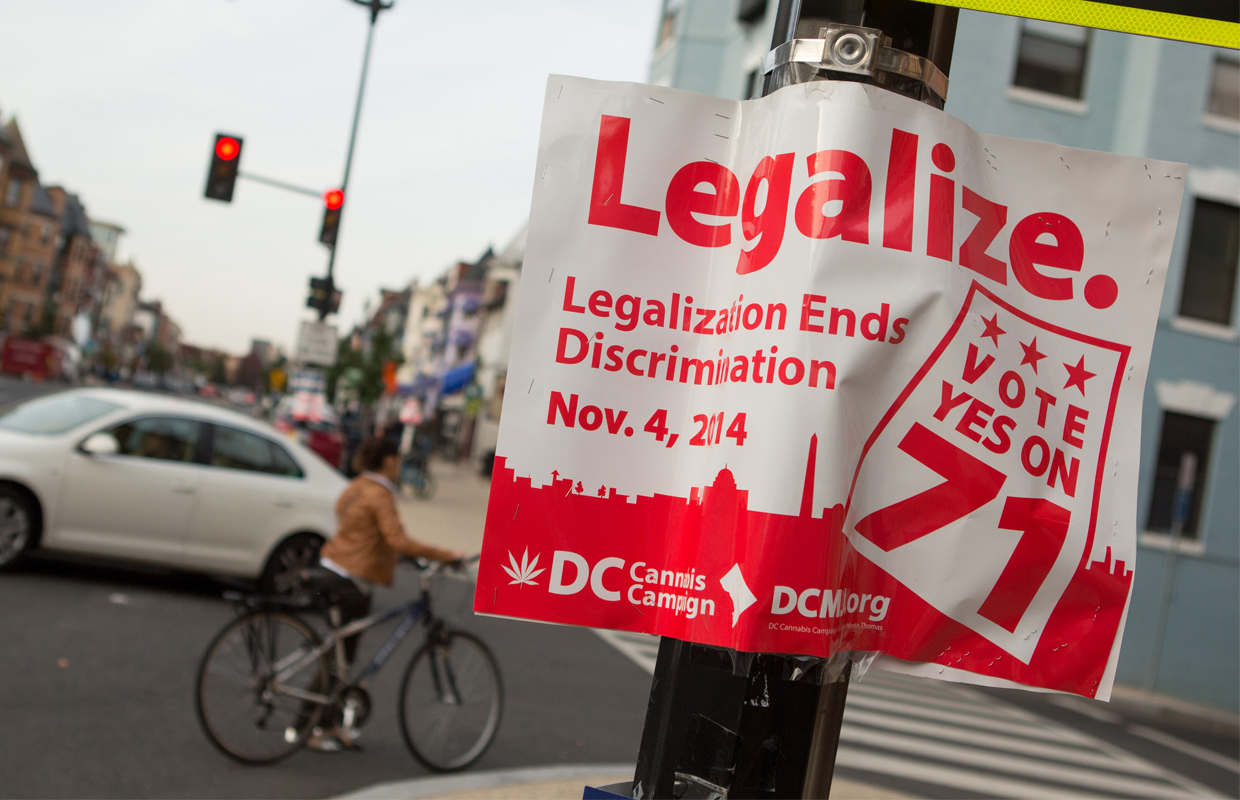 A flyer stuck to a telephone pole urges voters to legalize marijuana, which is proving to be a bipartisan issue.