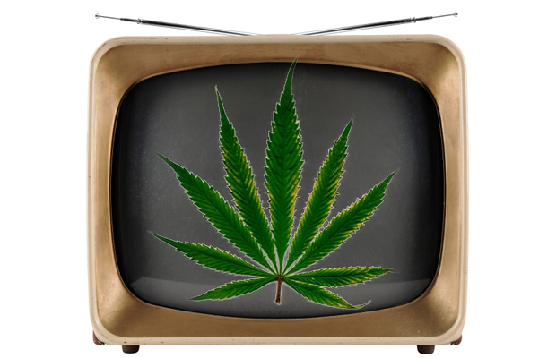 An old TV sets is branded with a pot leaf.