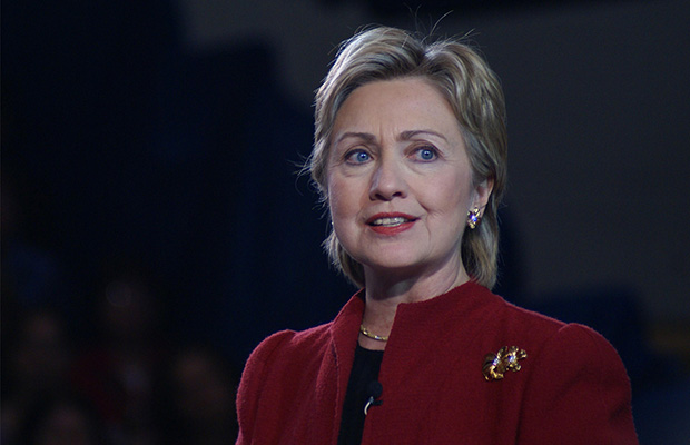 Hillary Clinton Wearing Red Jacket and Brooch
