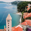 Beautiful Blue Waters Against the Beach and Village of Rab Croatia