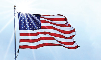 An American Flag Flaps in the Breeze Under the Sun