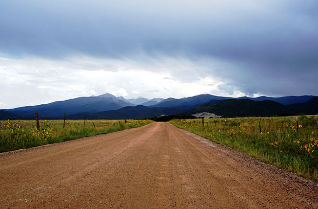 A Dirt Road Leads to the Mountains of Colorado