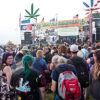 Crowds Gather at a Stage During the Seattle Hempfest