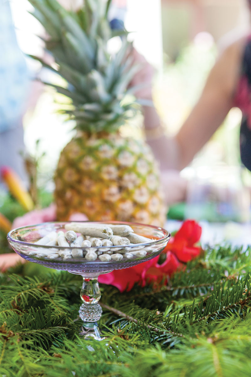 A pedestal of joints grace the table at a Flower Girl tasting event.