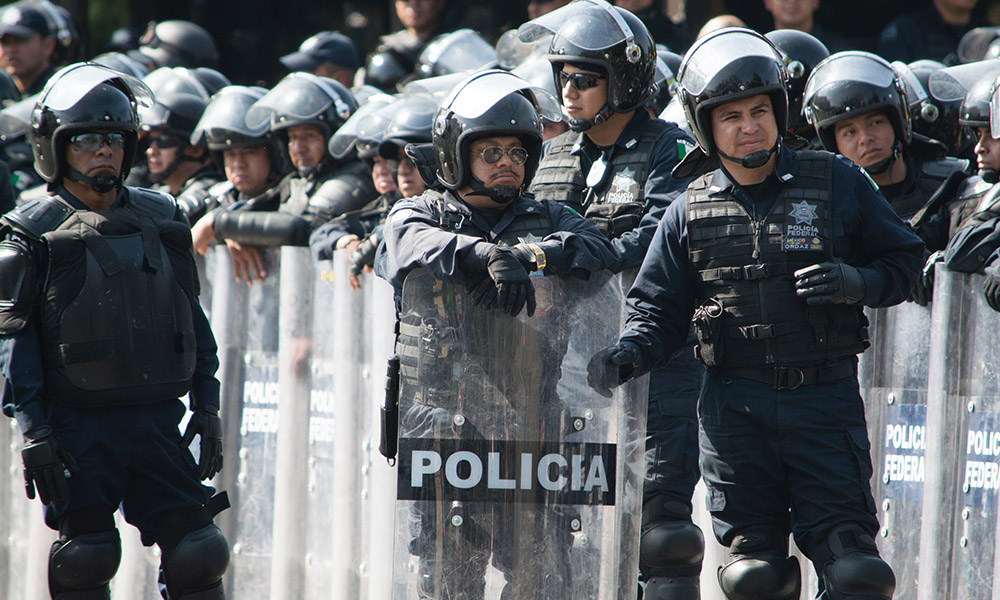 Riot Police Break Up Protest Smoke-a-Thon in Colombia