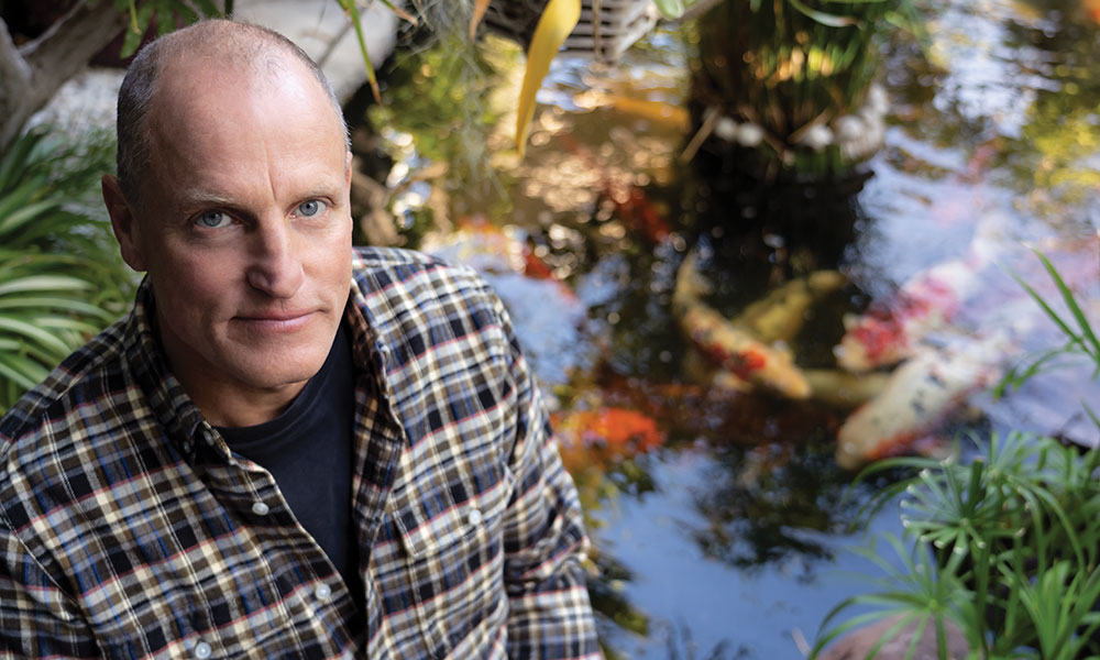 Woody Harrelson with Koi carp at theWOODS